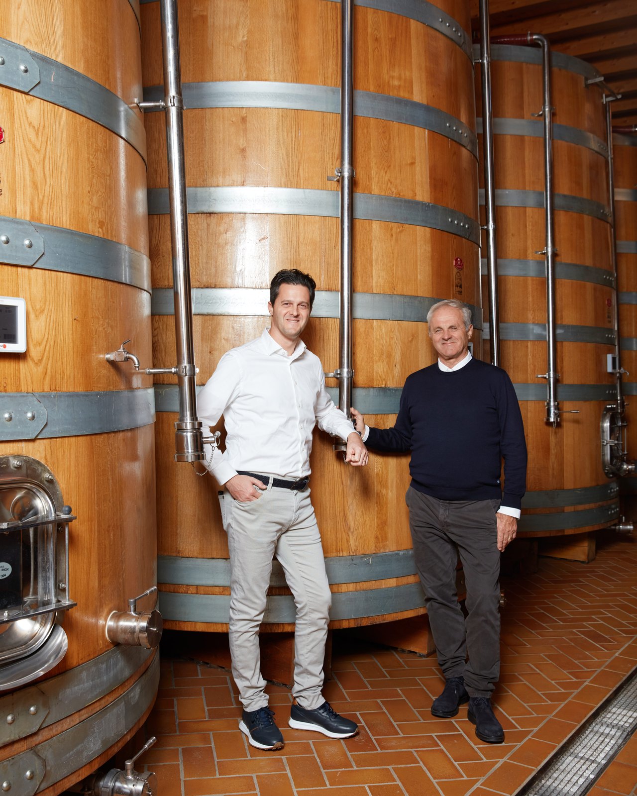 The Cottini family in the oak cask cellar